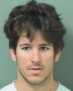 charged with assault