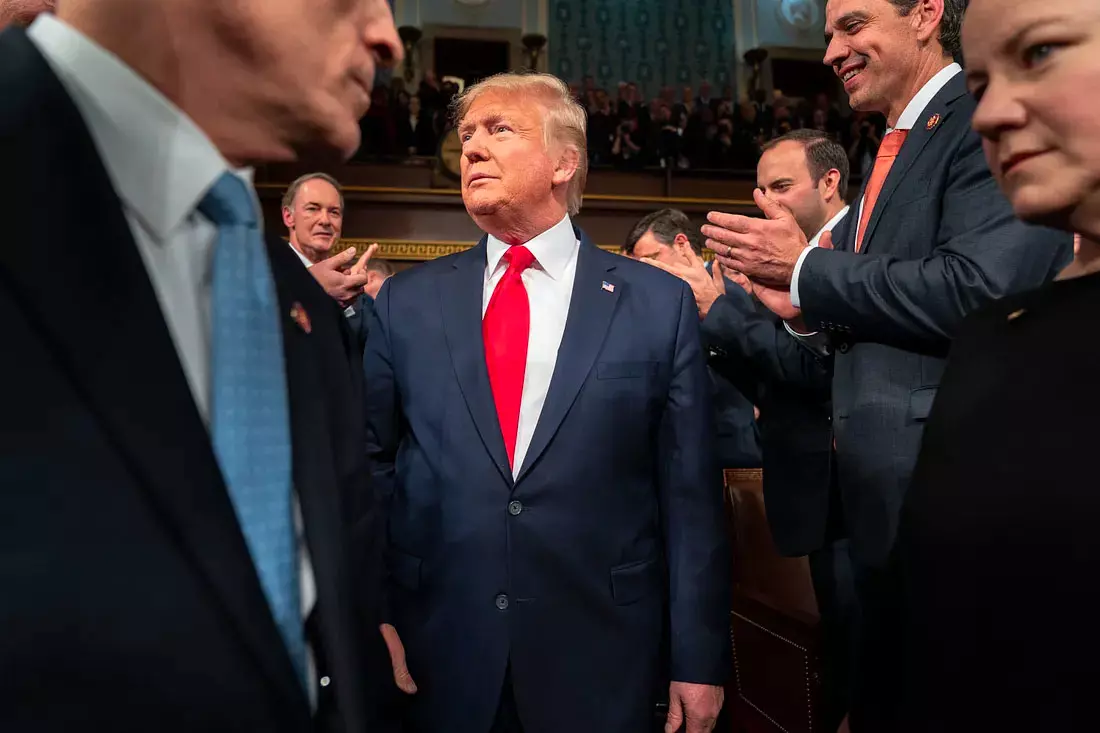 Then-President Donald Trump enters the House chamber for his 2020 State of the Union speech. Official White House photo by Shealah Craighead. Via Mickey Friedman